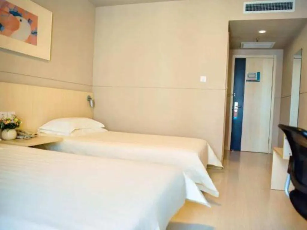 Bed in Jinjiang Inn Weihai Liugong Island Scenic Spot Shopping Market