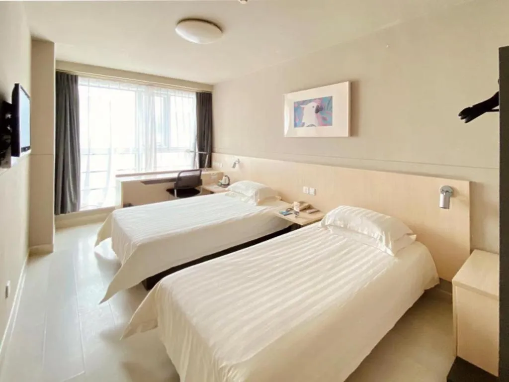 Bed in Jinjiang Inn Weihai Liugong Island Scenic Spot Shopping Market