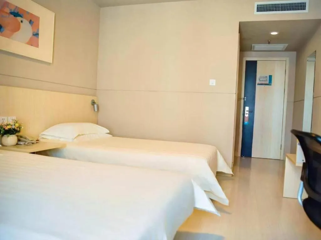 Bed in Jinjiang Inn Weihai Liugong Island Scenic Spot Shopping Market