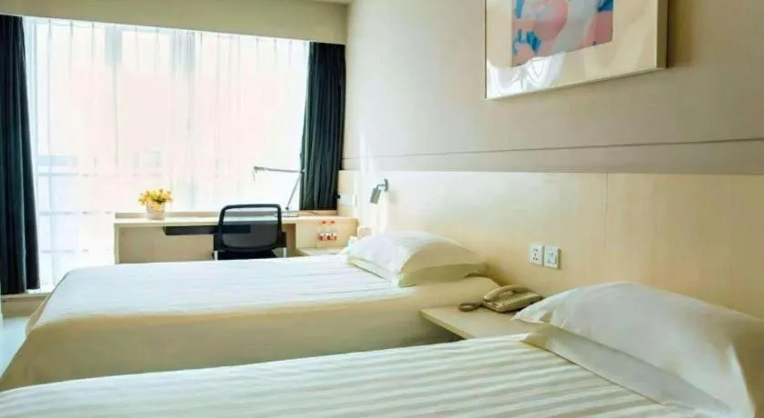 Bed in Jinjiang Inn Weihai Liugong Island Scenic Spot Shopping Market