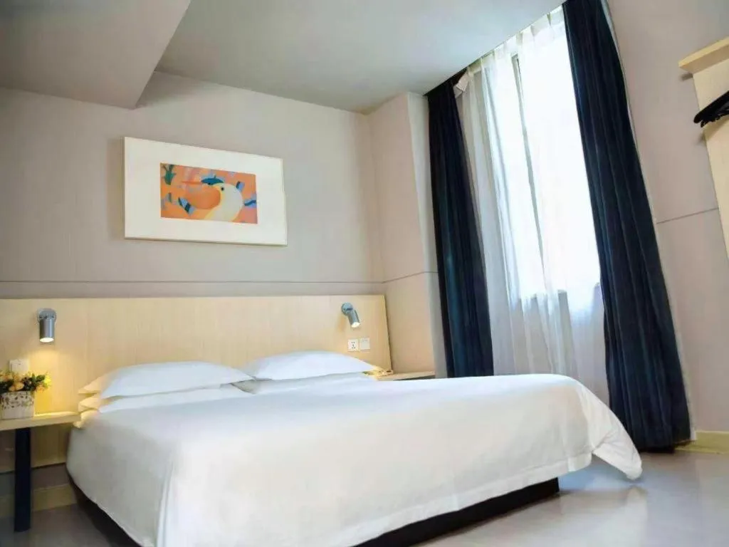 Bed in Jinjiang Inn Weihai Liugong Island Scenic Spot Shopping Market