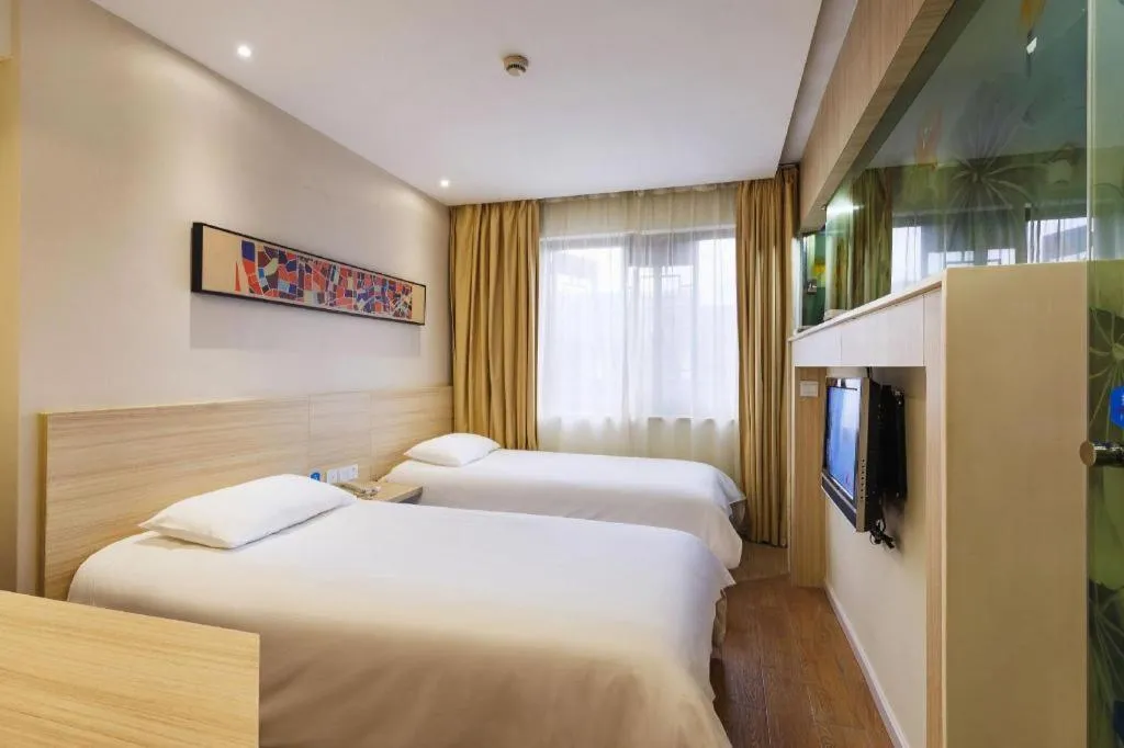 Bed in Hanting Hotel Hangzhou West Lake Longjing Road