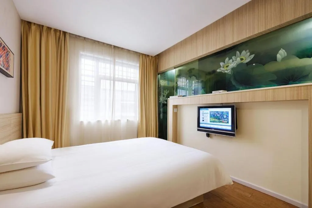 Bed in Hanting Hotel Hangzhou West Lake Longjing Road