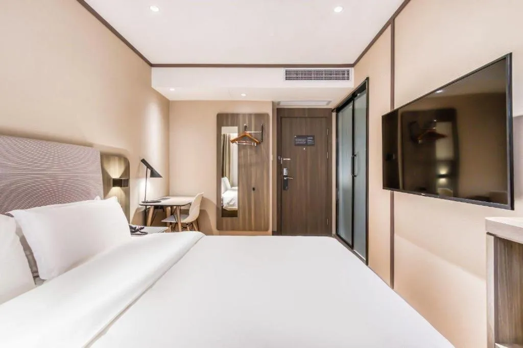 Bed in Hanting Hotel Hangzhou West Lake Longjing Road