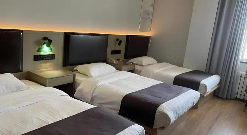Bed in GreenTree Inn Liaoning Province Huludao City Xingcheng Shoushan Express Hotel