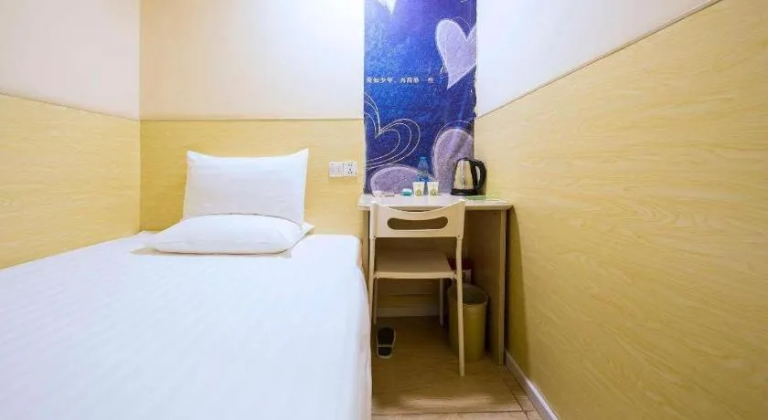 Bed in Hi Inn Guangzhou Gangding Metro Station