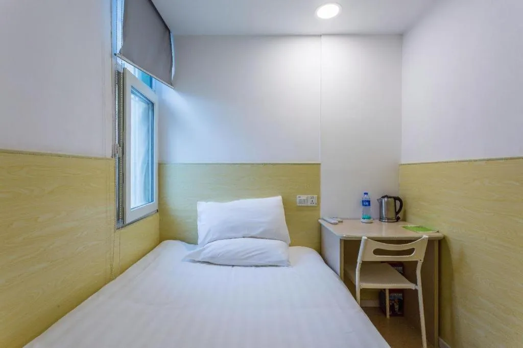 Bed in Hi Inn Guangzhou Gangding Metro Station