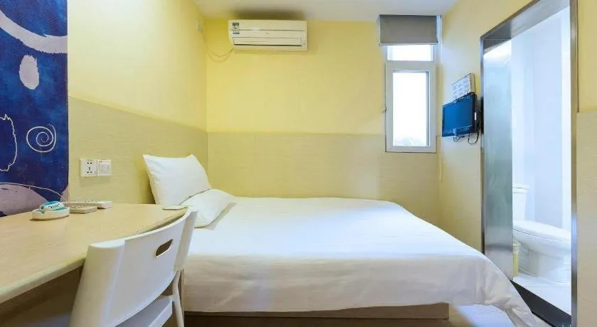 Bed in Hi Inn Guangzhou Gangding Metro Station