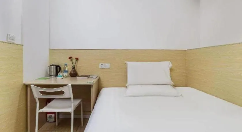 Bed in Hi Inn Guangzhou Gangding Metro Station