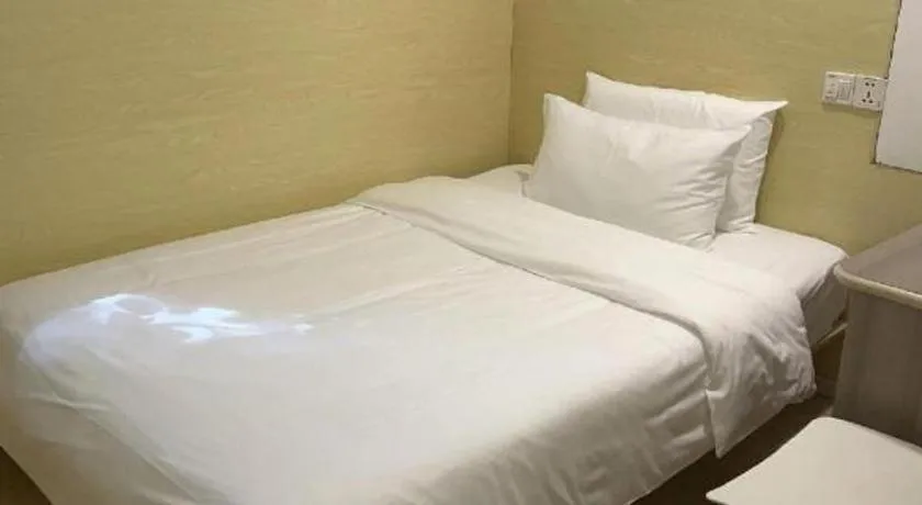 Bed in Hi Inn Guangzhou Gangding Metro Station