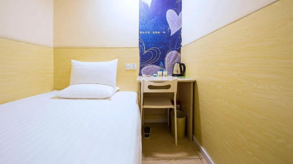 Bed in Hi Inn Guangzhou Gangding Metro Station