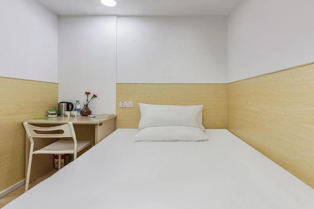 Bed in Hi Inn Guangzhou Gangding Metro Station