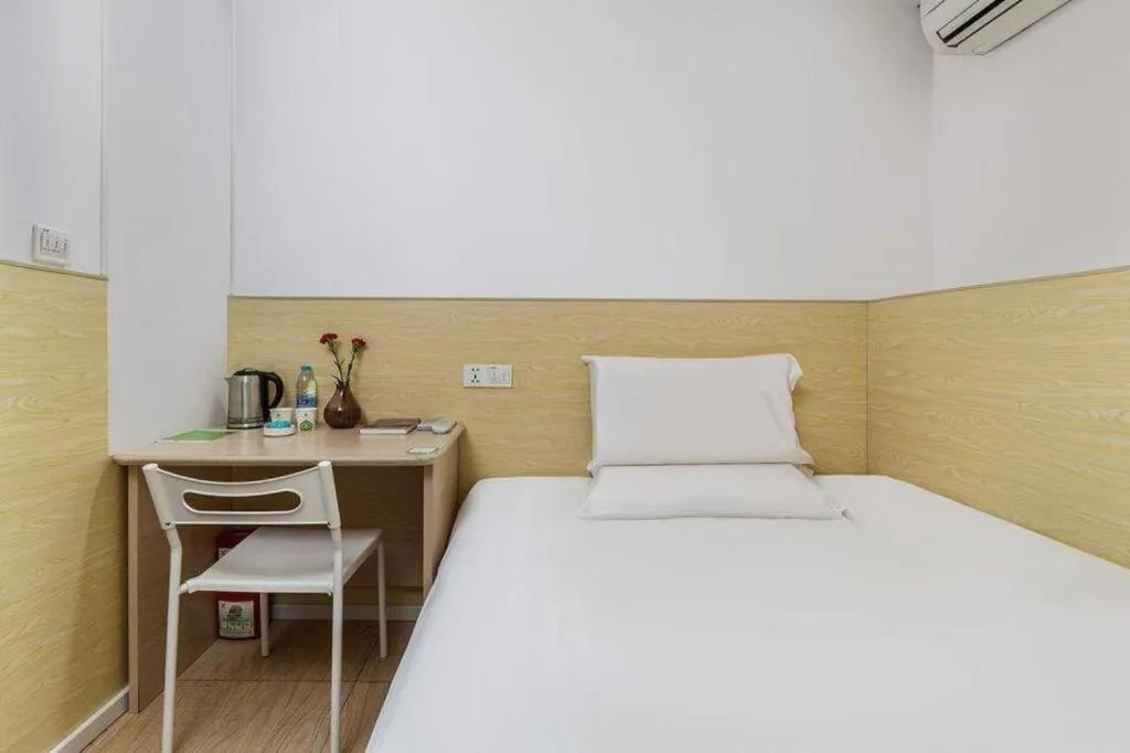 Bed in Hi Inn Guangzhou Gangding Metro Station