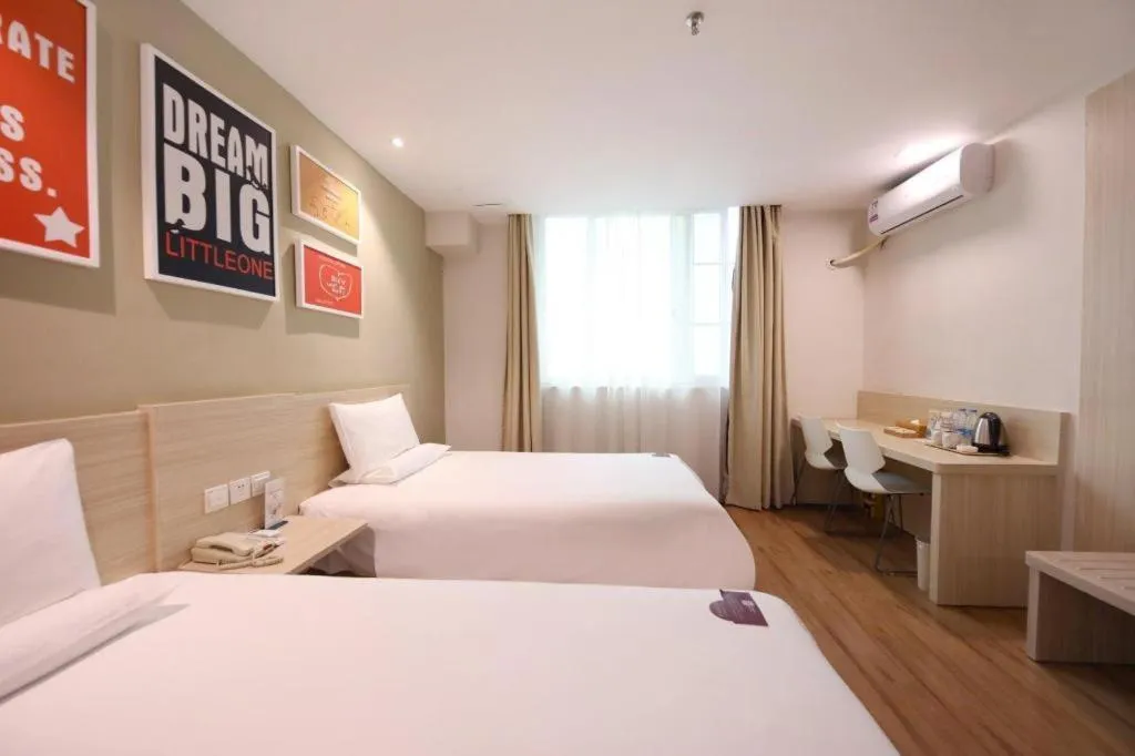 Bed in Hi Inn Guangzhou Gangding Metro Station