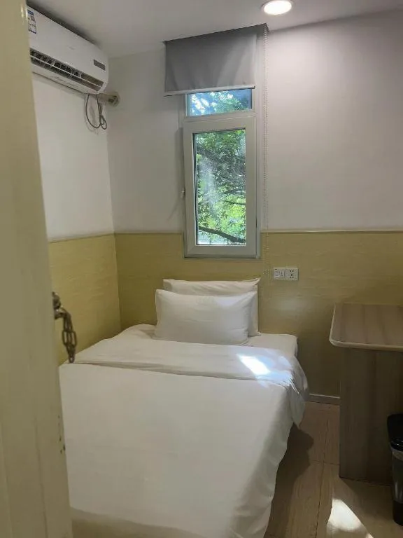 Bed in Hi Inn Guangzhou Gangding Metro Station