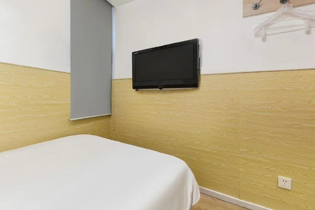 Bed in Hi Inn Guangzhou Gangding Metro Station