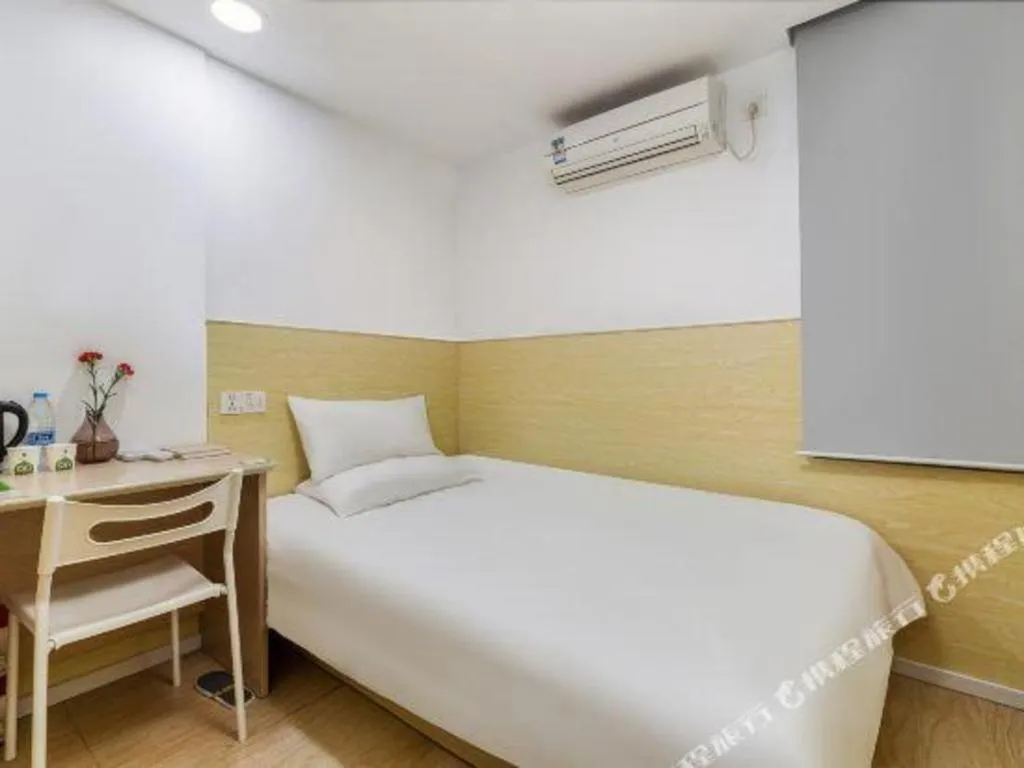 Bed in Hi Inn Guangzhou Gangding Metro Station