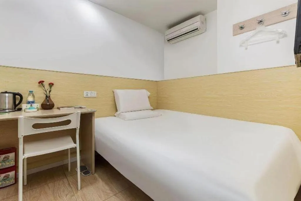 Bed in Hi Inn Guangzhou Gangding Metro Station