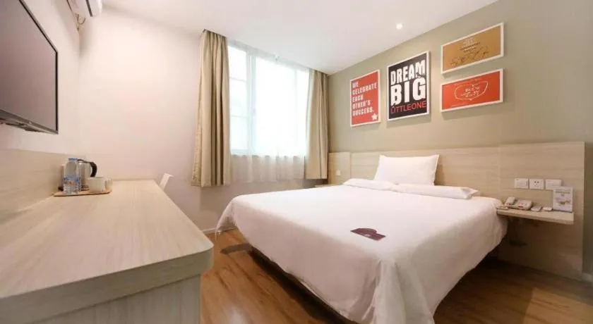 Bed in Hi Inn Guangzhou Gangding Metro Station