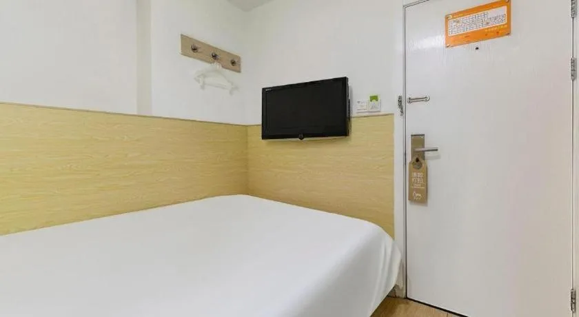 Bed in Hi Inn Guangzhou Gangding Metro Station