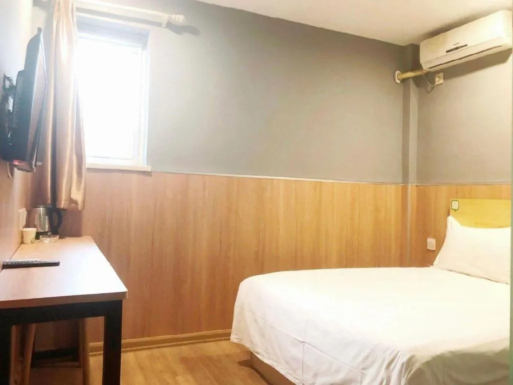 Bed in Hi Inn Guangzhou Gangding Metro Station