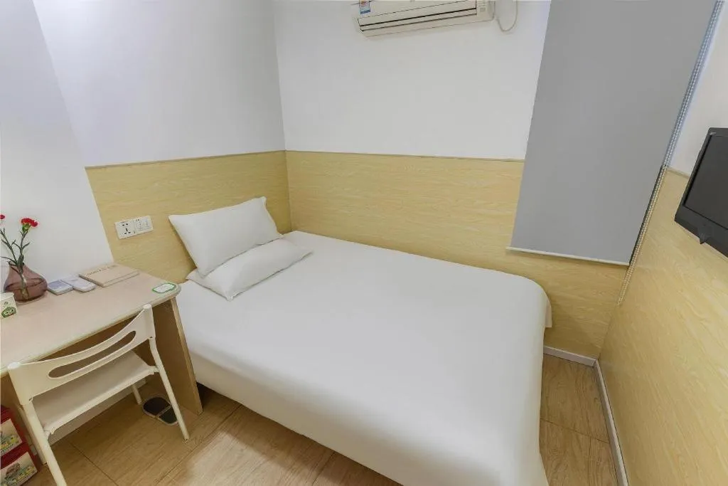 Bed in Hi Inn Guangzhou Gangding Metro Station
