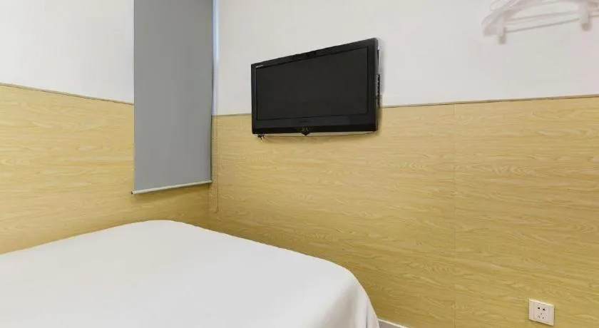 Bed in Hi Inn Guangzhou Gangding Metro Station