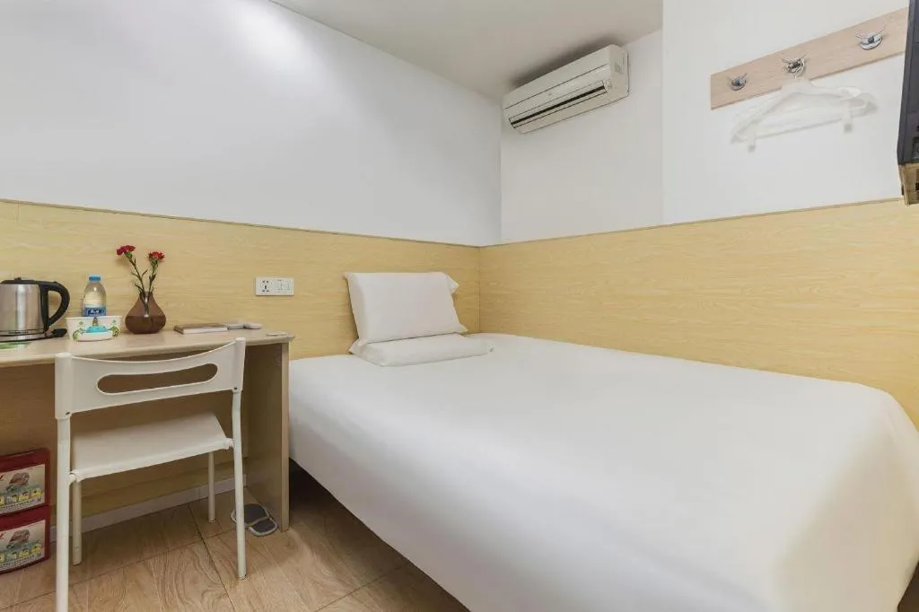 Bed in Hi Inn Guangzhou Gangding Metro Station