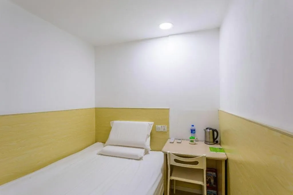 Bed in Hi Inn Guangzhou Gangding Metro Station