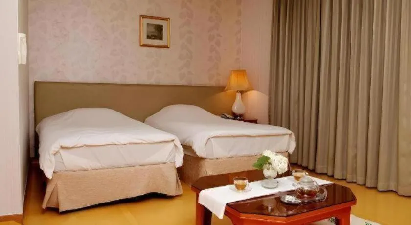 Bed in Onyang Hot Spring Hotel