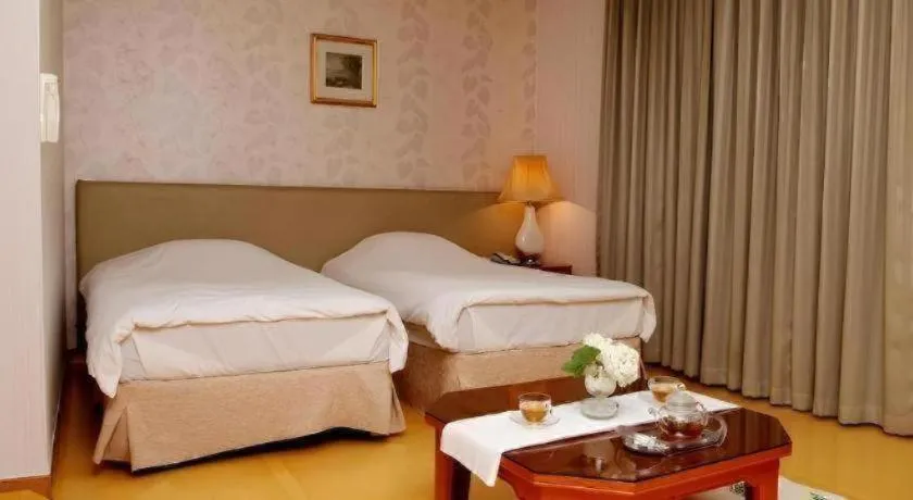 Bed in Onyang Hot Spring Hotel