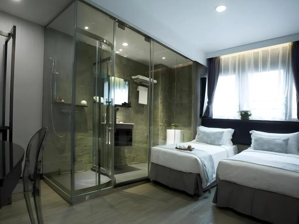 Bed in M1 North Point Hotel