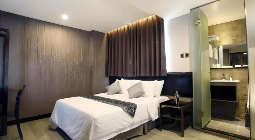 Bed in M1 North Point Hotel