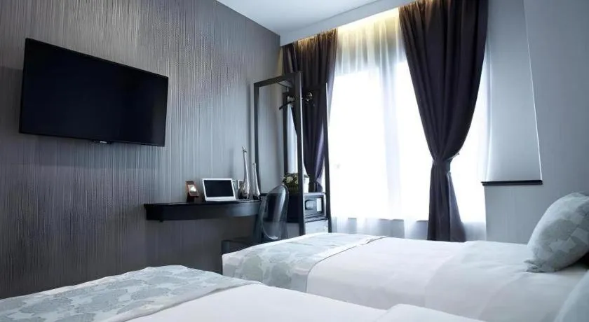 Bed in M1 North Point Hotel