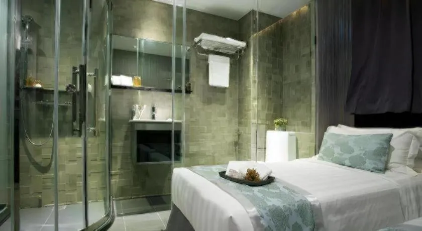 Bed in M1 North Point Hotel