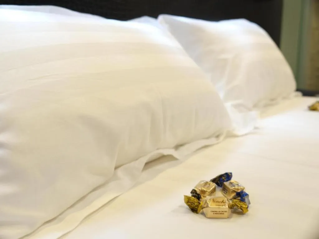 Bed in M1 North Point Hotel