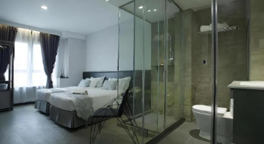 Bed in M1 North Point Hotel