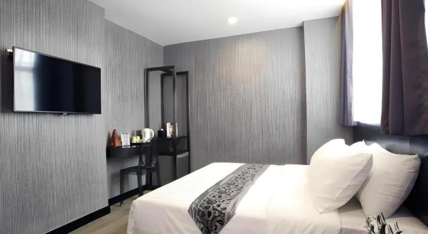 Bed in M1 North Point Hotel