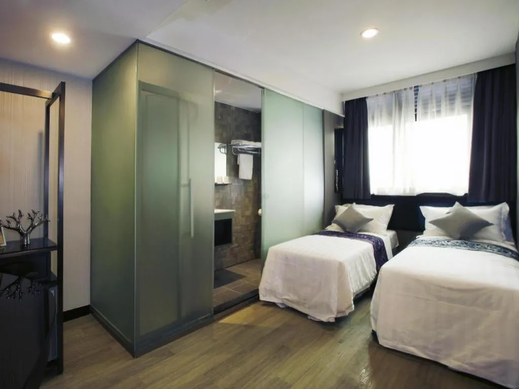 Bed in M1 North Point Hotel