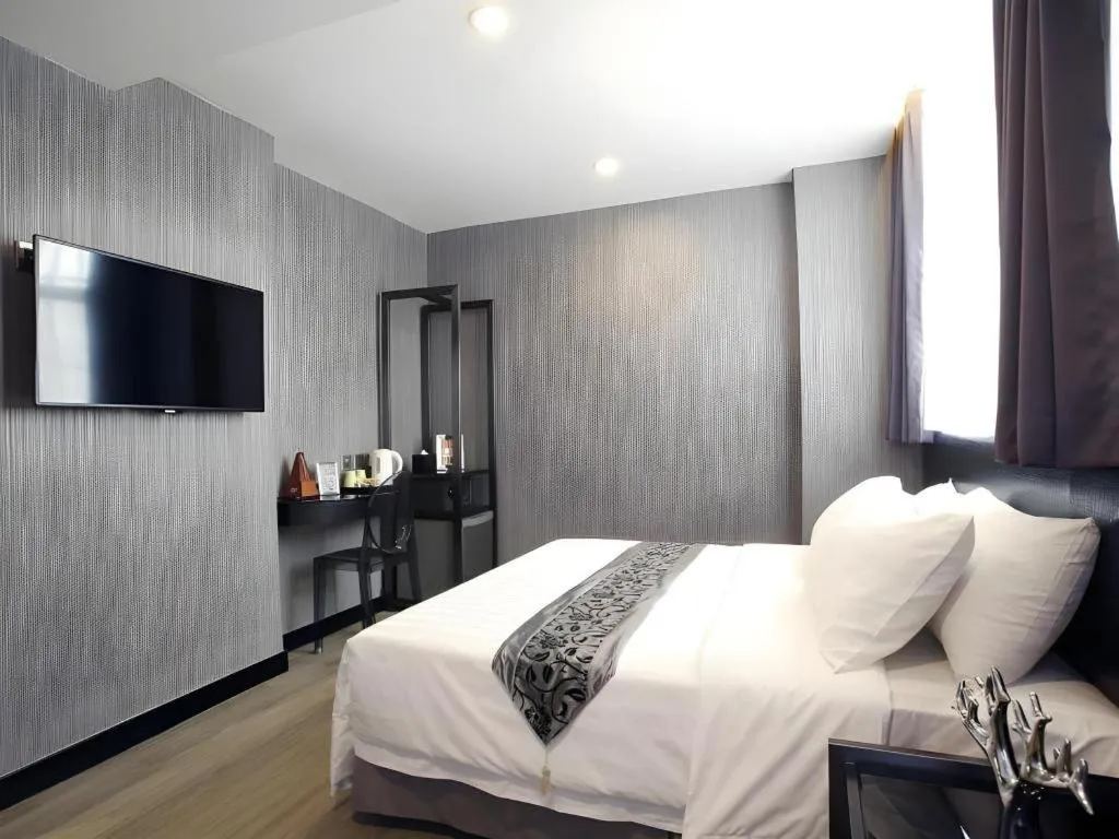 Bed in M1 North Point Hotel