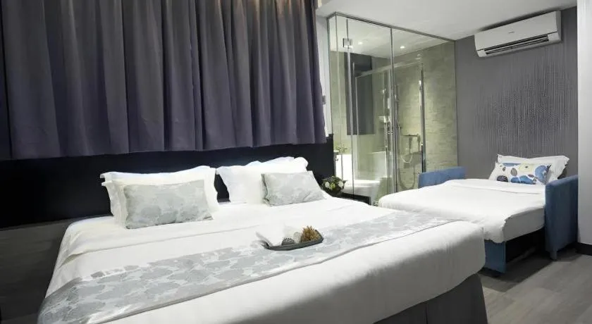 Bed in M1 North Point Hotel