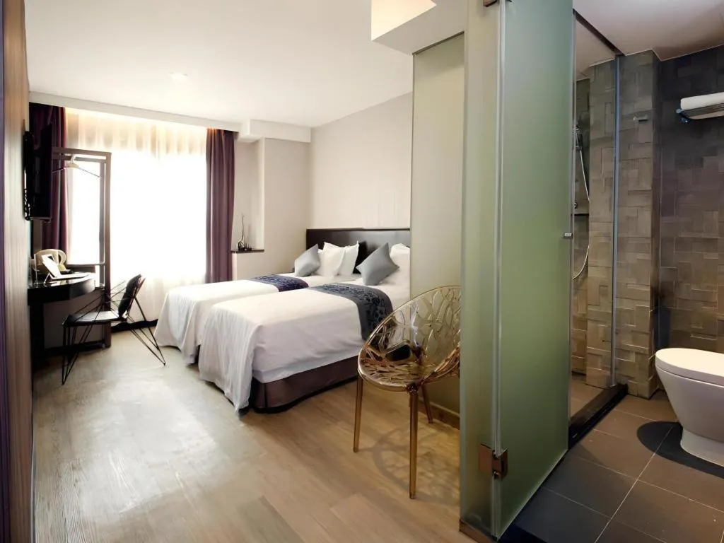 Bed in M1 North Point Hotel