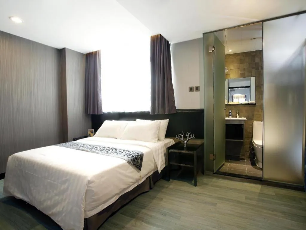 Bed in M1 North Point Hotel