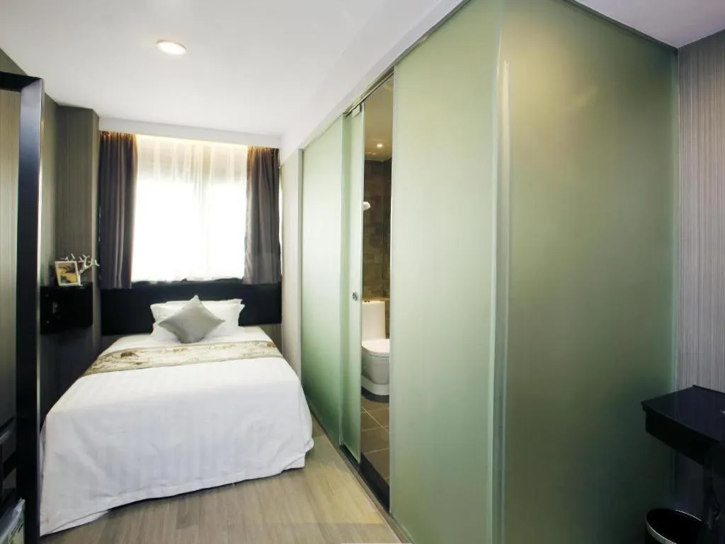 Bed in M1 North Point Hotel