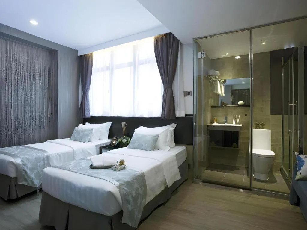 Bed in M1 North Point Hotel