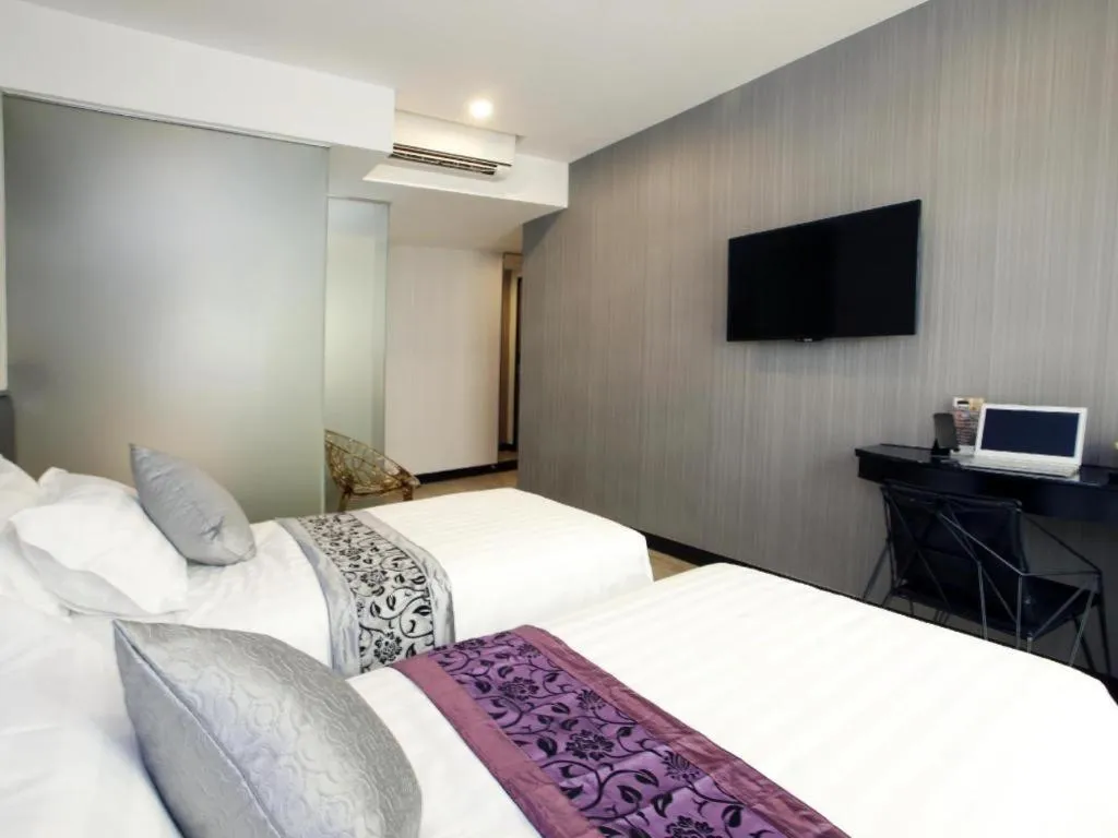 Bed in M1 North Point Hotel