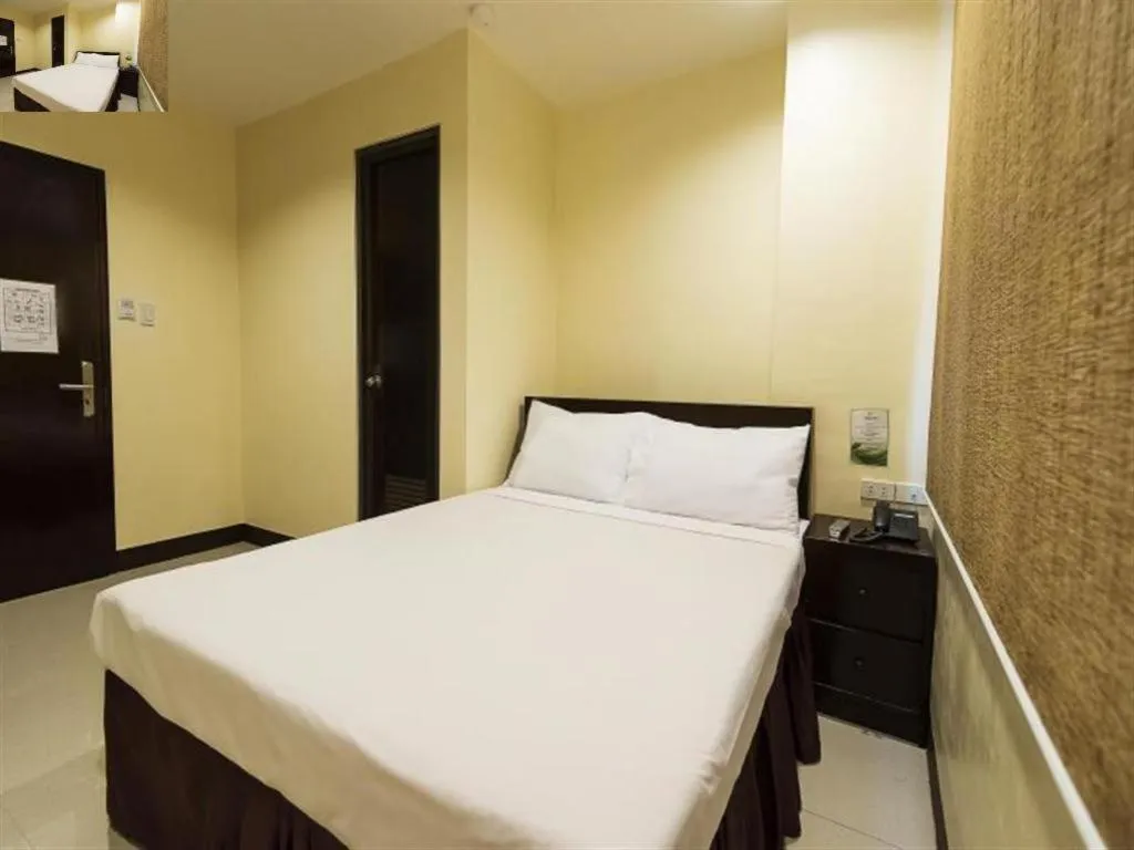 Bed in Winzelle Suites