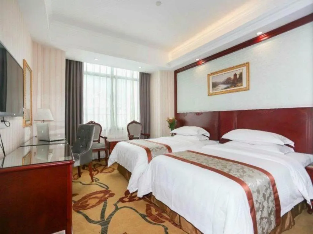 Bed in Vienna Classic Hotel Ningbo Xiangshan Wanda