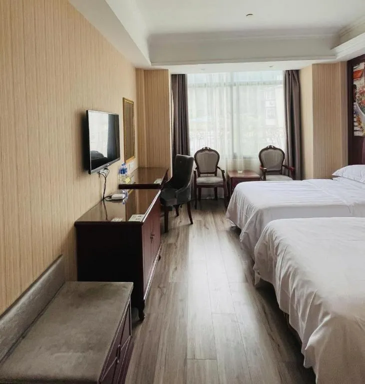 Bed in Vienna Classic Hotel Ningbo Xiangshan Wanda