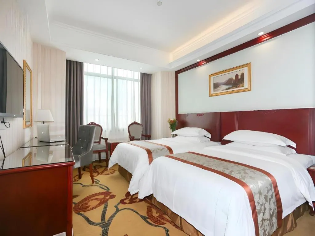 Bed in Vienna Classic Hotel Ningbo Xiangshan Wanda